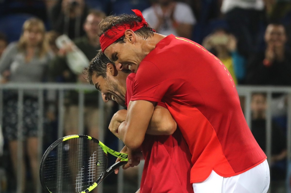 Nadal avanza en Río y jugará por las medallas en dobles junto a López el día que se despiden Ferrer, Muguruza y Suárez Nadal avanza en Río y jugará por las medallas en dobles junto a López el día que se despiden Ferrer, Muguruza y Suárez